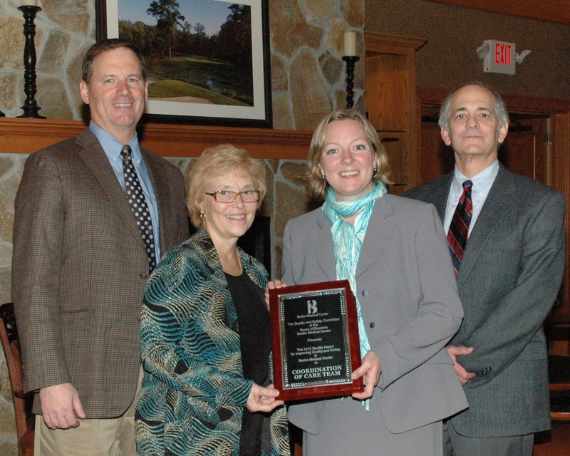 The Coordination of Care Initiative team leader was Megan Williams, FNP-COPC, Director of Population Health. Other team members were: Dianne Bane, RN, Andrew Lightfoot, Linda Sapienza, RN, and Beth West, RN. Pictured here, left to right, are: Dr. Fanto, Dianne Bane, Megan Williams and Jeffrey M. Fried.