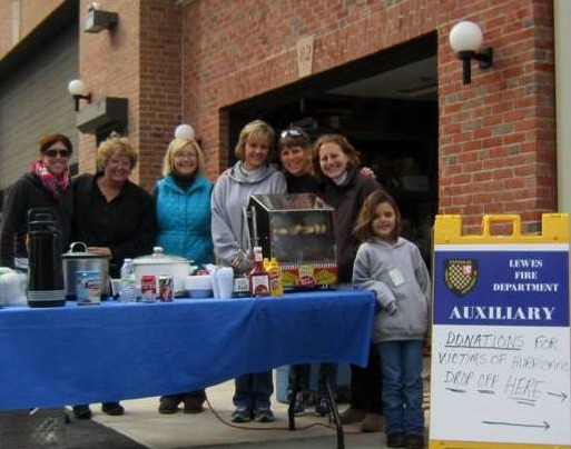 Members of the Lewes Fire Department Auxiliary are shown at their 2012 Election Day cocoa and hot dog sale. Shown (l-r) are Sara Esposito, Kathy Reinhart, Pat Schneider, Jennifer McMahon, Marcia Esposito and Nina Esposito. In front is McMahon's grandaughter, Abby Melito, who according to members is the best little salesperson ever. SOURCE SUBMITTED