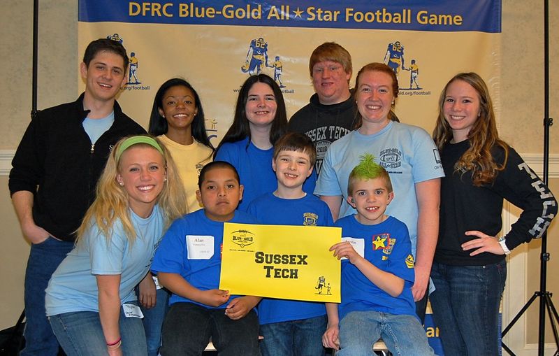 Sussex Tech students pose with their Blue-Gold buddies. In back are (l-r) Stephen Mervine, Jada Burbage, Buddy Jessica, Marshall Brown, Paige Robinson and Ashley Jump. In front are Taylor Hatfield and buddies Alan, Garrett and Austin. Missing from photo are Jessica Lux, Shelby McBroom and Sarah Timmons. SOURCE SUBMITTED