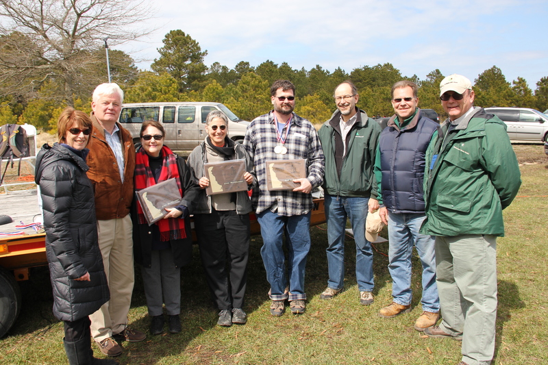 Shown with the awards are the recipients and several of the organizers of the event sponsored by Lewes Chamber of Commerce and Delaware's Division of Parks. They are (l-r) Lewes Chamber Executive Director Betsy Reamer, Lewes Chamber Board Member and Lewes Deputy Mayor Ted Becker, Joy Basinski, Jeanie Greenhaugh, Ben Huggett, Delaware Division of Parks Director Chaz Salkin, Lewes Mayor Jim Ford and Division of Parks Regional Administrator Pat Cooper. BY DENNIS FORNEY