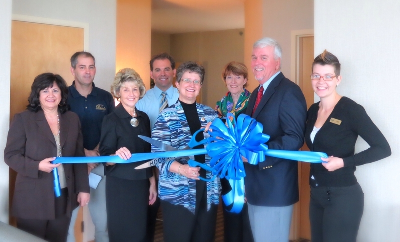 On hand for the ribbon cutting marking the opening of Atlantic Sands' newly renovated rooms are (l-r) Ann Marie Westerfield, Rehoboth Beach Main Street; Atlantic Sands Facilities Director Tom Head; Carol Everhart, Rehoboth Beach-Dewey Beach Chamber of Commerce; Scott Thomas, Southern Delaware Tourism; Atlantic Sands Director of Sales & Marketing Barbara Brewer; Betsy Reamer, Lewes Chamber of Commerce; Atlantic Sands General Manager Michael Ludden; and Atlantic Sands Front Desk Manager Jennie Goins. SOURCE SUBMITTED