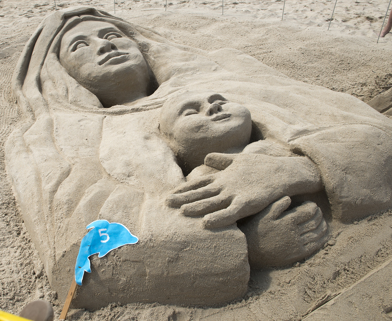 The Oakes and Shivone families of Rehoboth Beach and the Beaucage family of Rhode Island created a mother and child sculpture called "I Wonder as I Wander." They placed in the top 10 in the adult category. BY DENY HOWETH