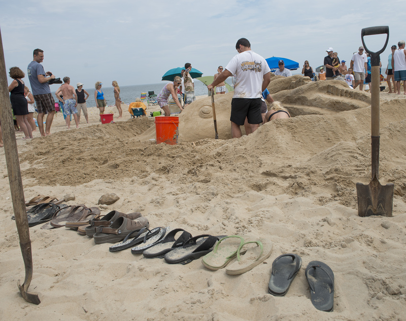 Team Sandoval had a method for keeping their sculpture clear of shoe prints and for keeping track of who was in the pit. BY DENY HOWETH