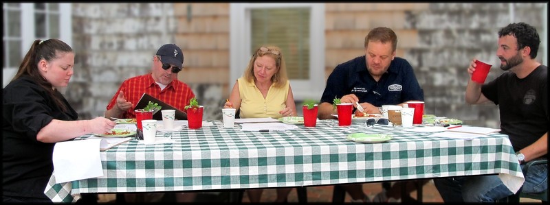 HLFM Tomato Festival judges are (l-r) Jenell Mattera from The Buttery; Ian Crandall from Kindle; Denise Clemons of the Cape Gazette; Brenton Wallace from Dogfish Head Brewpub; and Bill Clifton from Henlopen City Oyster House, who is enjoying Leo Eschbach’s prize-winning Heirloom Bloody Mary. BY JACK CLEMONS PHOTOS