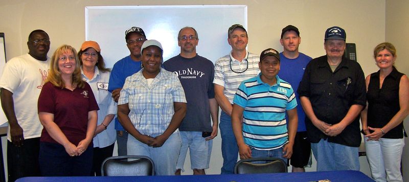 New Process Fibre Company employees who recently completed classes developed by the Sussex Tech Adult Division include (l-r) Bobby Sampson; Michelle Cathell, Sussex Tech Adult Division instructor; Donna Tappan; Michael Ross; Corethia Youngblood; Todd Rollins; Bob Passwaters; Santiago Ramirez; Rusty Emory; Dale Ostermann; and Kristin Lee, Sussex Tech Adult Division instructor. Not pictured is Floyd Fisher. SOURCE SUBMITTED