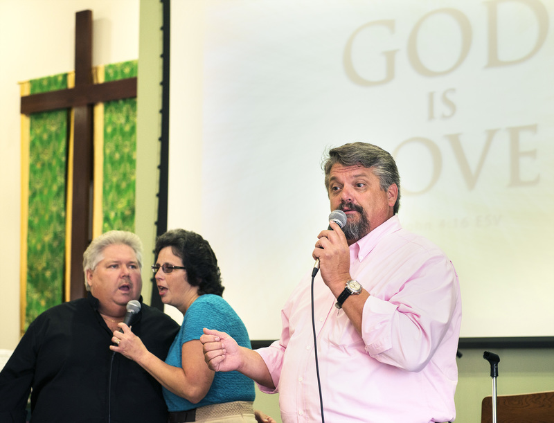 Bay City Ministries kept the crowd laughing and clapping. The trio is Jimmy and Melody Passwaters, left, and Jeff Wantz. BY DENY HOWETH