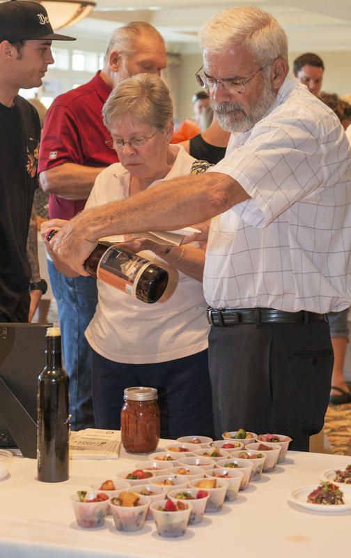 Jeff and Brenda Stone read about the Dogfish Head Red and White Brew that is in the tasting. Their niece was a recipient of March of Dimes funds and they are supporters of this near and dear cause. BY DENY HOWETH