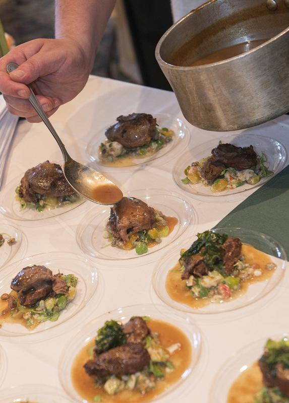 Berkshire Pork Cheeks on a local lobster salad with black eyed peas, green zebra tomatoes and toasted red russian kale, are topped with a Dogfish Head Tweason Ale. Au jus was offered by Chef Matthew Cornelius from Just Hooked Fenwick and Off the Hook Bethany. BY DENY HOWETH