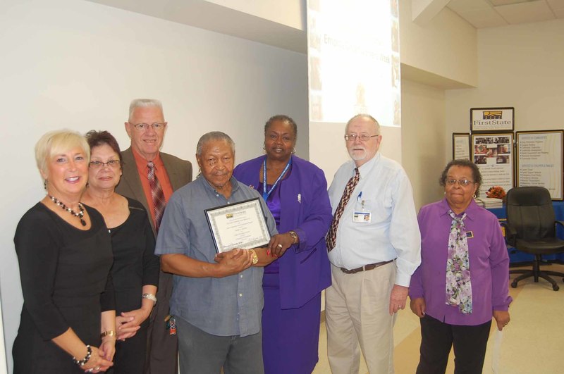Shown with the oldest SCSEP participant Melvin Snowden are (l-r) Rep. Ruth Briggs-King, R- Georgetown; Linda Dennis, Sussex County; Rep. Harvey Kenton, R-Milford; Snowden; Bernice Edwards, First State executive director; Roy Hazzard, Sussex County SCSEP manager; and SCSEP Job Developer Dorothy Harmon. BY STEVEN BILLUPS