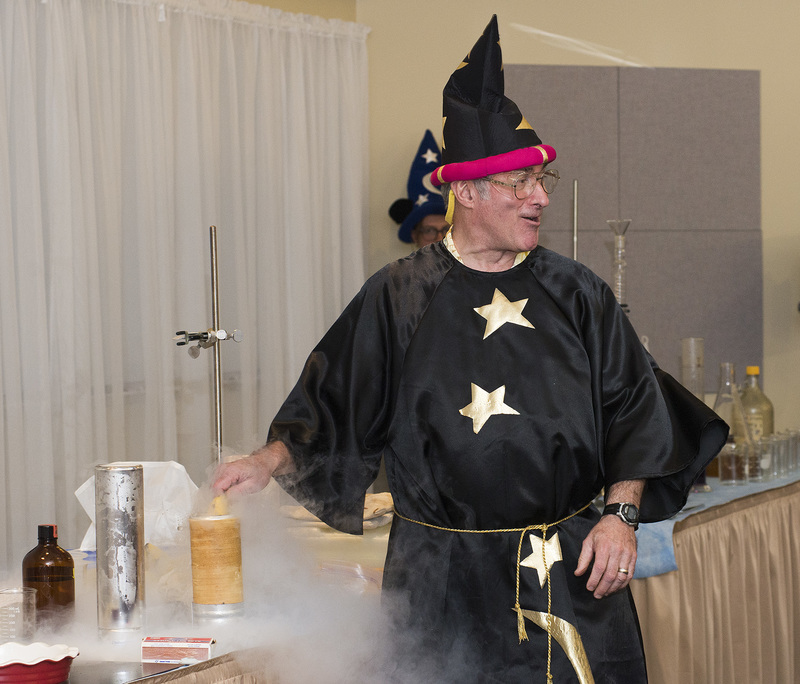 The Chemical Magician show used fun techniques to educate his audience about science. Here he makes a Bananahammer by freezing a banana using liquid nitrogen after which he will hammer a nail into wood. BY DENY HOWETH