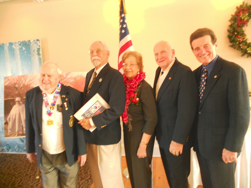 New officers of the Korean War Veterans Association Chapter 1 gather after taking their oaths of office. Shown (l-r) are George Goss, Department of Delaware state commander of the KWVA, who administered the oath of office; Dr. Charles Tjersland of Lewes, president; Joann Sedei of Millsboro, vice president; David Miller of Millsboro, treasurer; and John "Jack" McGinley of Harbeson, secretary. Their term of office is one year. SOURCE SUBMITTED