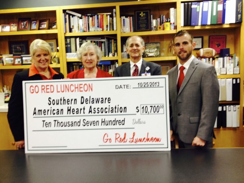 Pictured (l-r) are Karen Gritton, Southern Delaware director of special events, American Heart Association; Patricia Sandy, event chair, Sussex County Go Red For Women; Jeffrey Fried, president and CEO, Beebe Healthcare; and Daniel Green, senior director, American Heart Association Southern Delaware. SOURCE SUBMITTED