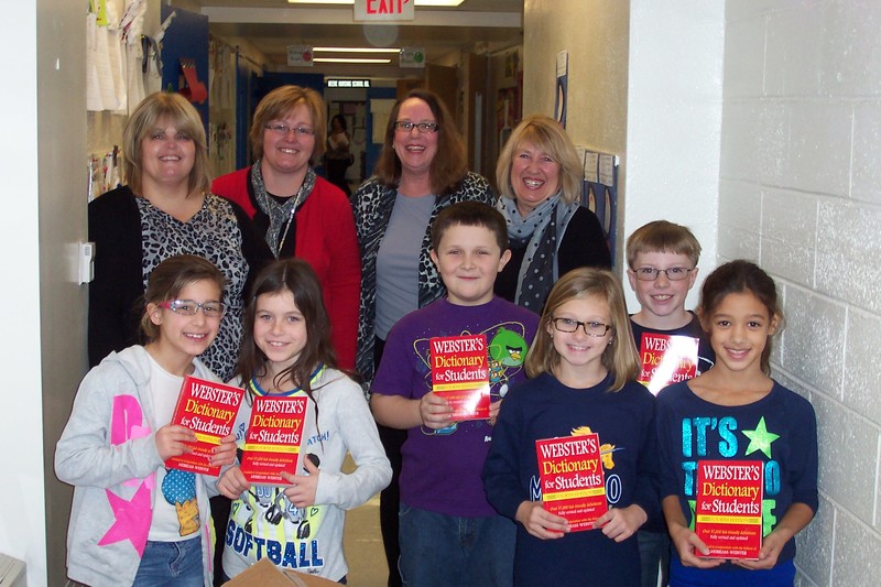Third-grade students and staff gather to thank Sussex County Republican Women's Club members for personal dictionaries which the club provided. In back are (l-r) East Millsboro Principal Kelly Dorman, Assistant Principal Pamela Webb, SCRWC President Gale White and Dictionary Project Chair Donna Repass; in middle, Sean Anderson and Cole Rogers; in front, Karli Schrader, Arianna Cordrey, Kamryn Payne and Mia Jackson. SOURCE SUBMITTED