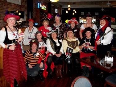 The Pirates of The Red Hat Society gather at the Blue Water Grill in Millsboro for their first luncheon. In back (l-r) are Eva Coppersmith, Dorothy Dobbyn, Della Strobel, Queen Elizabeth Heagy, Queen Joyce Holland, Ann Burton and Captain BJ Young; in front are Rose Littleton, Darlene Vaughn, Virginia Shifflett, Phyllis Williams and Elsie Parkhouse. SOURCE SUBMITTED