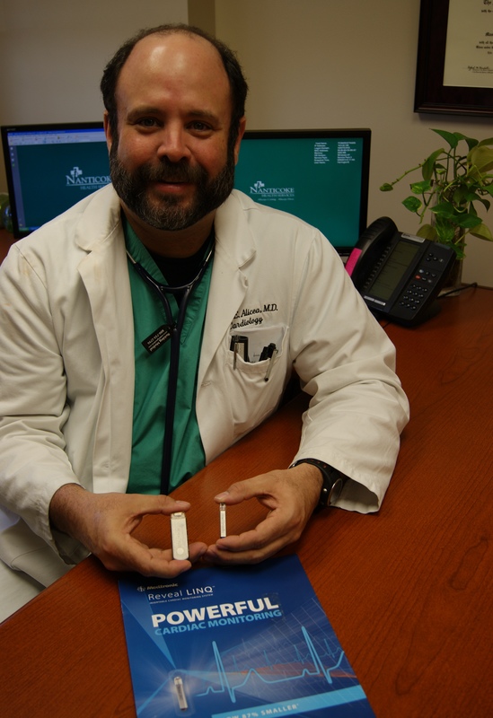 Nanticoke Health Services is among the first in the U.S. to use the new Reveal LINQ cardiac monitor. Dr. Angel Alicea with Nanticoke Cardiology shows the new monitor (in photo on right) that is 87% smaller than previous monitors (in photo on left). This device is easier to insert and provides physicians with daily information about a patient’s heart through a secure wireless connection. Nanticoke is the first hospital in Delaware, Maryland and Virginia to offer patients access to this new technology.