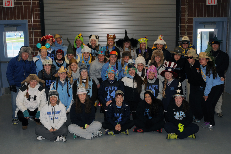 Members of the 2014 girls lacrosse squad took a little fun time before practice to celebrate their annual crazy hat day. Shown in back are (l-r) Coryn Cannon, Allie Yeager, Sarah Tappan, Sarah Rambo, Sarah Hyde, Karalyn Joseph, Cailey Thornburg, Sophia Hall, asst coach Debbie Windett and asst coach Rich Collins and (next row l-r) head coach P J Kesmodel, Morgan Catts, Lauren Kelley, Tess Bernheimer, Lizzie Frederick, Lindsey Voss, Jordan Brown, Karissa Lemaire, Hannah Derrickson, Maggie Delp, Kat Judge, Alexa Woodruff and Riley Wagner and (next row l-r) asst coach Megan Fullmer, Alison Palmer, Alyssa Craig, Amanda Smith, Grace Brokaw, Katie Boyer, Kaitlyn Klabe, Korrine Lemaire, Taylor Jefferson and (front row l-r) Olivia Bloom, Iseabal Cryne, Shea Sugrue, Aileen Tekmen and Olivia Wilson. BY DAN COOK