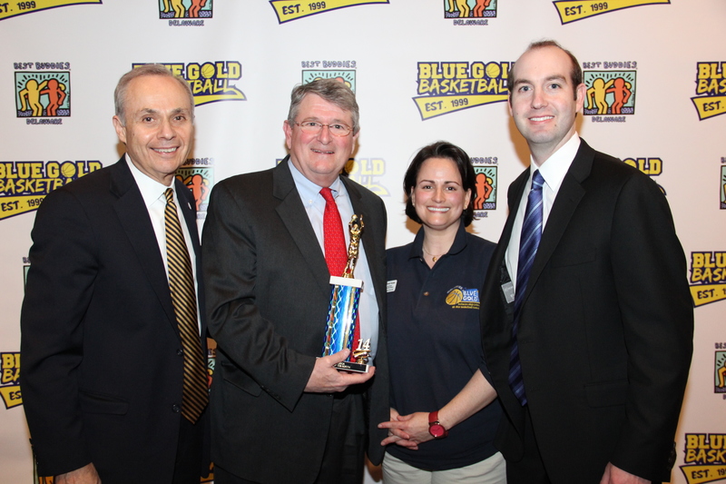 Shown at the 2014 Blue-Gold Delaware High School All-Star Basketball Games banquet are (l-r) Morton Kimmel, founder of the Blue-Gold basketball games; Community Service Award recipient Hugh Leahy; Best Buddies Delaware State Director Amanda Foxman; and Larry Kimmel, chairman, Blue-Gold Board of Trustees. BY DENNIS FORNEY