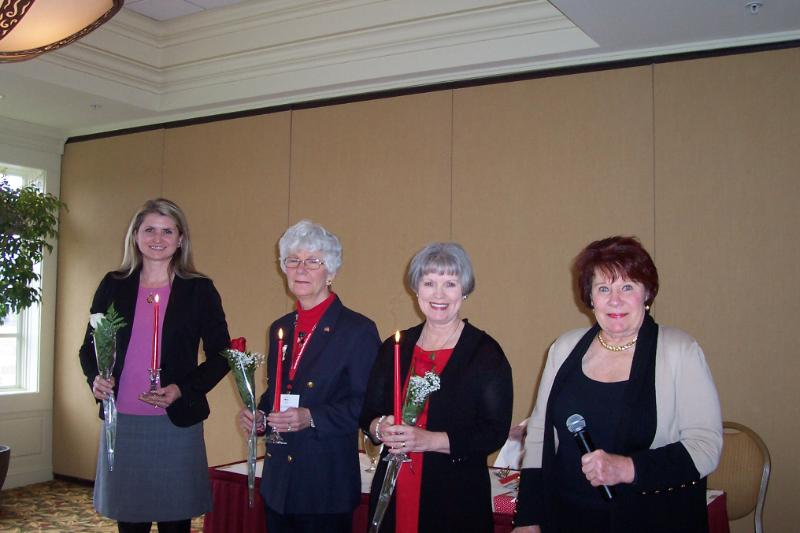 The Sussex County Republican Women's Club's newly elected officers are (l-r) President Alana Keeley, Recording Secretary Jan Stevenson and Treasurer Sally Duveneck with Installing Officer Mary Spicer. The new officers each hold lighted candles symbolically representing the passing of the light, the importance of passing on the Republican philosophy, and the responsibility of serving as an officer. SOURCE SUBMITTED
