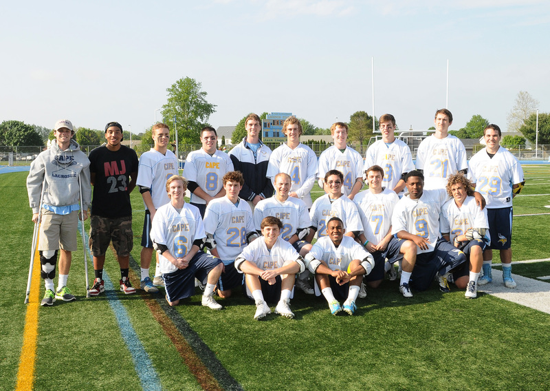 Cape boys' lacrosse class of 2014 includes in back (l-r) Matt Kane, Steve Collins, Aaron Mattioni, Thomas Ott, Craig Fanto, Grant Gillan, Cory Kreis, Todd Keen, William Clampitt and Garrett Becker; middle, Nate Katurakes, Christian Prestipino, Blake Mann, Hunter Dailey, Luke Benson, Juan Saez and Charlie Burton. In front are Austin MacCoy and Justin Lopez. BY DAN COOK