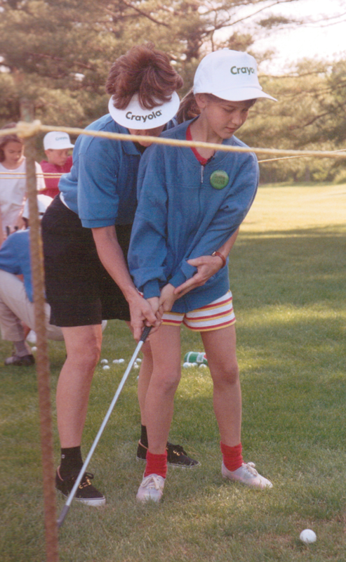 The young girl in this picture, taken in June 1994, is receiving a golf lesson at a clinic held during the LPGA championship at the DuPont Country Club. That same young girl is on the left side of the second picture. It is Carolyn Schranck Theim, now director of member engagement for the YMCA of Delaware. BY FRITZ SCHRANCK