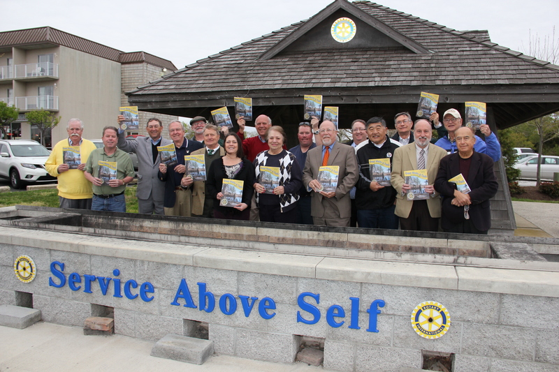 Members of Lewes-Rehoboth Rotary Club show their 2014 Great Walks and Trails in Sussex County trail guide. They are (l-r) Walt Bryan, Jack Hoban, Blase Gavlick, Mike South, Kevin Hester, Larry Fifer, Tamara Morgan, President Bruce Summer, Lynn Cecil, Shane Raley, Vic Amey, Bob Lore, John Li, Paul Carey, Gerry Smith, Dr. Jack Dawson and Dr. Anis Saliba. BY DENNIS FORNEY