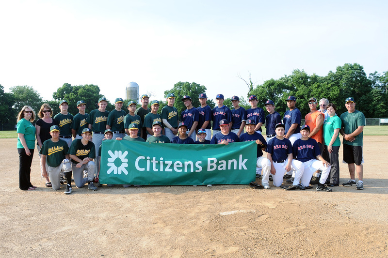 Showing their appreciation to Citizens Bank are in back (l-r) Citizens Bank Branch Manager Erin Baker, league Treasurer Cindy Brown, Reese White, Kyle Lux, Danny Lewis, Matt Taylor, Dwayne Harmon, coach Rich Carey, Richard Carey, Noah Clifton, Briley Brooks, Jackson Ostrowski, Austin Elliott, Anthony Hitchcock, Grant Evans, Jared Kay, Josh Fonville, coach Vinnie Evans, umpire Andy Lewis, Citizens Bank personal banker Karen Hogate, and league president Bill Lux. In front are RJ Clarke, Zach McFarland, Nick Everly, Wes Lewis, Jake Sirandes, Trevor Daisey, Luke Smailer, Garrett Catts, Jason Xiong, Buddy Borradaile, and Kolby Wyatt. BY DAN COOK