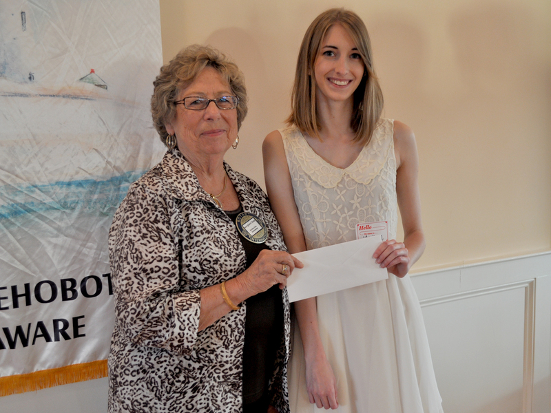 Georgiann Deist, left, of the Youth Scholarship Committee presents a $4,000 Scholarship to Madison Long of Cape Henlopen High School. Long is pursuing a career in filmmaking, writing and cinematography. She created a promotional video of the after-school enrichment program titled "Cape Carousel." SOURCE SUBMITTED
