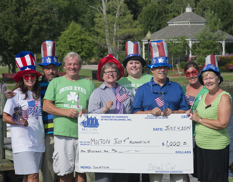 On hand for the presentation are (l-r) Charlene Jones, Irish Eyes owner; John Potoki, Milton chamber member; Tom Jones, Irish Eyes owner; Marie Mayor, Milton chamber member; Mary Ellen Kiernan, Irish Eyes public relations; Mike Clark, Milton chamber member; Dana Smith, Irish Eyes general manager; Vicki Sammons, Milton chamber member. BY DENY HOWETH