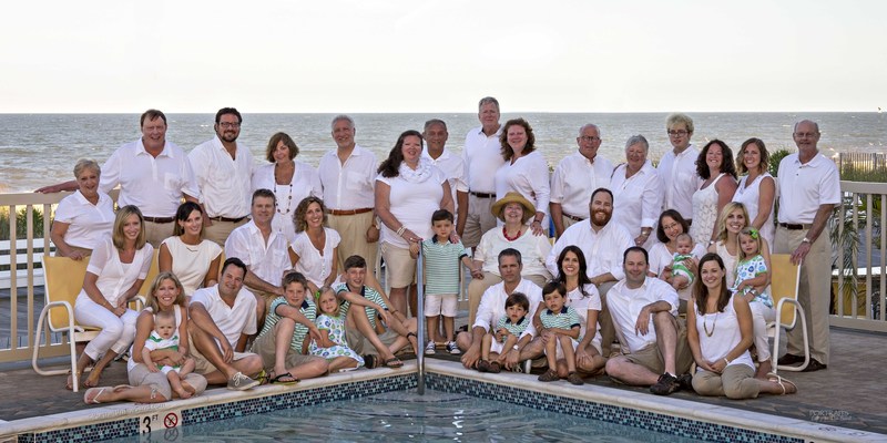 Members of the Pursglove family gather poolside at the Atlantic Sands. In back are (l-r) Sandy Pursglove, Sam Pursglove, Anthony Pursglove Bartlett, Susan Pursglove Bartlett, Avery Bartlett, Lesley Mullins Balta, Jose Balta, Steve Glenn, Margaret Mullins Glenn, John Boyer, Sarah Pursglove Boyer, Tom Boyer, Cortney Golub, Anne Pursglove Boyer and Joseph Pursglove; middle row, Alexandra Pursglove, Melanie Pursglove, Chris Ritter, Suzanne Bartlett Ritter, Lucas Balta, Hattie Jo Pursglove Mullins, Ben Boyer, Xenia Trejo, Ella Trejo Boyer, Jessica Olmon and Colette Pursglove Olmon; in front, Samantha Pursglove Westerlund, Joseph Pursglove Westerlund, Bob Westerlund, Logan Ritter, Sarah Ritter, Leo Ritter, Justin Feldman, Ashton Feldman, Michelle Bartlett Feldman, Cole Feldman, Sam Pursglove II and Laura Abshire. BY DAVE KOSTER
