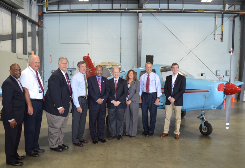 Delaware Congressional delegation announces $5 million grant for infrastructure improvements at Delaware Airpark. (photo left – right) DRBA Airports Director Stephen Williams; DRBA Commissioner Rick Downes; DRBA Executive Director Scott Green; U.S. Representative John Carney; DSU President Dr. Harry Williams; U.S. Senator Chris Coons; FAA Regional Manager Lori Pagnanelli; U.S. Senator Tom Carper; and DRBA Vice Chairman Bill Lowe. COURTESY DRBA