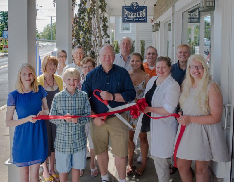 Shown are in back (l-r) Lou Braithwaite, Gavin Braithwaite, Lewes Mayor Ted Becker and Lewes Deputy Mayor Fred Beaufait. In the second row are Betsy Reamer, Lewes Chamber; Judy Doyle, employee; Sarah Smith, employee; and Rob Morgan, Lewes City Council. In front are Alexandra Southerst, John Southerst, Tim Southerst, Andrea Spuck and Elizabeth Southerst. SUBMITTED PHOTO