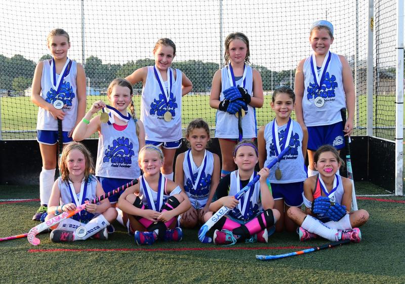 The Delaware Shore Field Hockey Association Summer League Elementary Division champions the Tides are in back (l-r) Addison Wood, Hayden Hazzard, Leighton Swope and Leah Metzner. In middle are Alex Ellis, Caroline Williamson and Angie McCarthy. In front are Teagen Baker, Emmi Swope, Anna Crenshaw and Claudia Stazzone. DAN COOK PHOTOS
