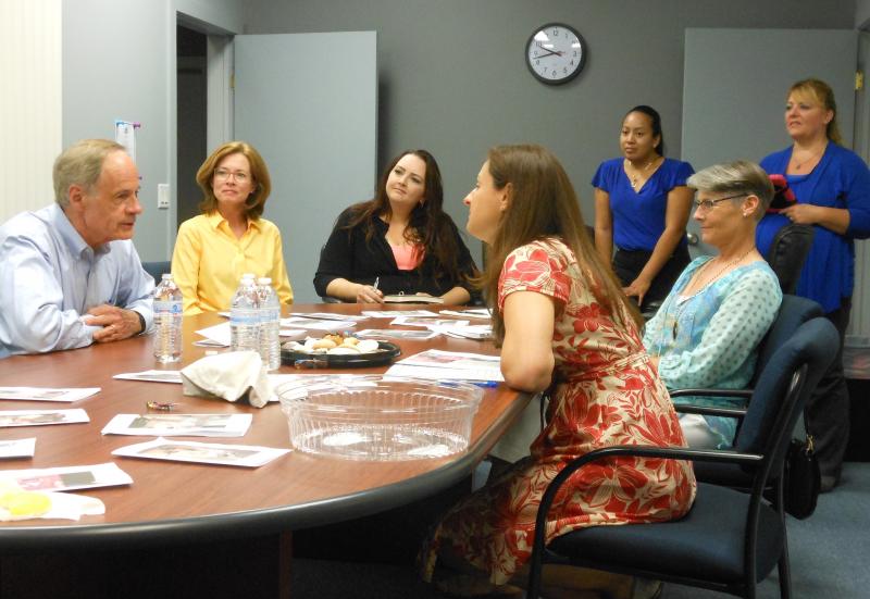 During a recent visit to Autism Delaware near Lewes, Sen. Tom Carper listened to how a change in Medicaid would affect Delaware’s citizens with autism spectrum disorders. Shown with Carper, clockwise around the table from his left, are parent Susan Patel, POW&R team lead Theresa Klinger, Autism Delaware family navigator Heidi Morales, POW&R staff Kari Moore, parent Sharon Crist and POW&R assistant director Melissa Martin. CHRIS FLOOD PHOTO