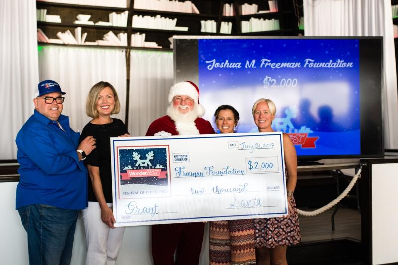 The Joshua M. Freeman Foundation is just one of the nonprofit groups that received Community Grants from Festival of Cheer Inc. during their Christmas In July celebration in Dewey Beach. Over $100,000 in grant funding was awarded to 17 Sussex nonprofit organizations from the 2016 Winter WonderFEST fundraising activities. Foundation members pictured with Santa (l-r) Lewis Drexel Davison, board member; Patti Grimes, executive director; Denise Allen, volunteer coordinator; and Molly Williams, sales and patron experience manager. SUBMITTED PHOTO