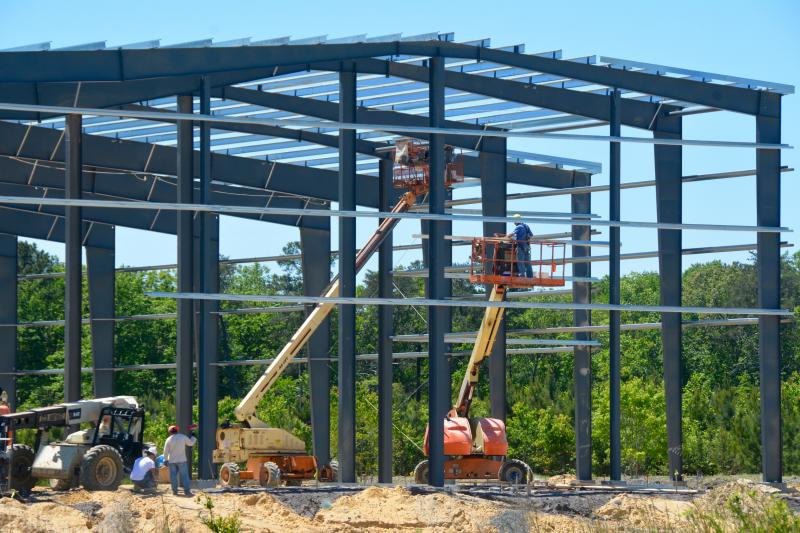 Sussex County’s proposed fiscal year 2018 budget included nearly $4 million to develop a county business park along Park Avenue adjacent to the county’s airport and current industrial park. Atlantis Industries Corporation broken ground and had its building under construction on the 74-acre parcel over the summer. RON MACARTHUR PHOTO