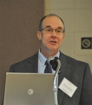 Geologist Kelvin Ramsey talks about the natural loss of shoreline over the past 75 years. BY RON MACARTHUR