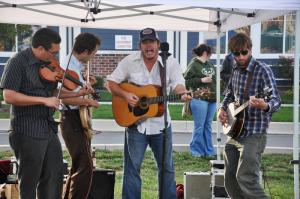 Chester River Runoff plays for the large crowd at the Milton Farmers' Market's Oktoberfest event. BY NICK ROTH
