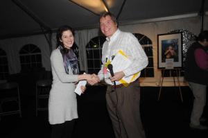 Winning the Morris and Roslyn Fierberg Student Film Award is Sarah Rosen, left, a 2012 graduate of Yale University, for her film “Food of Love.” Presenting the award is Greg Jones, Rehoboth Beach Film Society education and outreach director. BY STEVEN BILLUPS