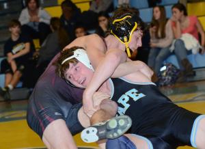 Cape's Austin Smith grapples to a pin over Milford's Trey Kohel at 1:35 of the 145 weight class. The Vikings went on to score a 57-16 win over the Bucs. BY DAN COOK