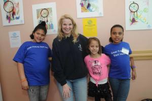The Rehoboth Boys & Girls Club members brought their Native American inspired Dream Catchers mixed with what their dreams actually look like. Shown are (l-r) Leann Collick, Director Maria Edgerton, Haylee Workman and Kyla Collick. BY STEVEN BILLUPS