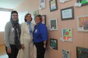 Delaware Hospice brought art from its New Hope's program. New Hope is a nationally-recognized program designed by Delaware Hospice for children who are coping with the death of a loved one. Shown with the art are (l-r) Allison Veith, New Hope Sussex County counselor; Peggy Dellea, associate director of development; and Cheryl Doucette, Sussex County community education coordinator. BY STEVEN BILLUPS