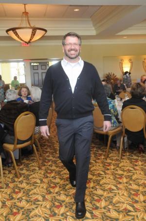 Local artist Nick Serratore shows a 5-button cardigan sweater over a white poplin cotton, long-sleeve shirt from Donna Karan New York. BY STEVEN BILLUPS