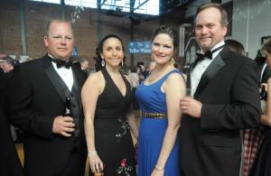 Friends (l-r) Phil Donoway, Claudia Melvin and Eileen and Ed Bennett spend some time together at the reception.
