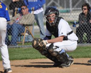 Cape senior catcher Brandon Keller looks into the dugout for direction on the next pitch. BY NICK ROTH