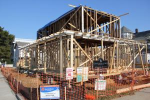 A few months ago I photographed this house under construction at the corner of First and Olive in Rehoboth. The owners preserved 50 percent of the former structure so they could rebuild on the existing footprint which also included a second smaller dwelling. The next photo shows the finished product.