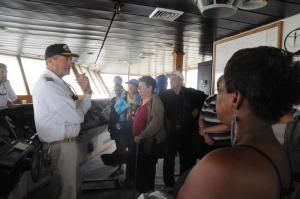 Shown inside the bridge of the Twin Capes Ferry is Captain Robert Vance, describing the operation of the ferry.