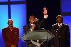 Elder Keith Sivels acted as Minister of Ceremony for the memorial service praising the lives of Eduardo and Priscilla. DAN COOK