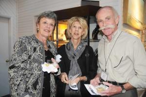 Socializing at the opening are (l-r) Carole Ellison and board of trustees members Gretta Etsey and Jim Ellison.