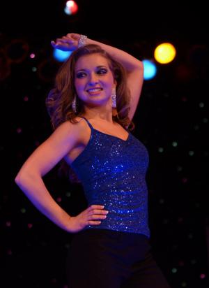 Rebecca Lusk, Miss Cape Henlopen, dances during the opening number before the introductions. BY DAN COOK