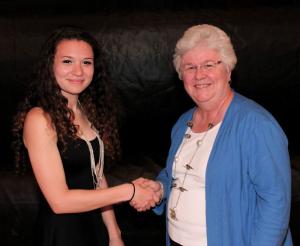 Fallyn Smith of Milton receives the Coastal Concerts, Inc. Scholarship from Denise Emery. SOURCE SUBMITTED